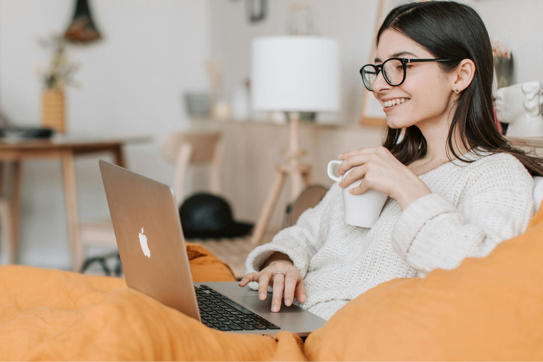 Slide of a girl looking to laptop screen